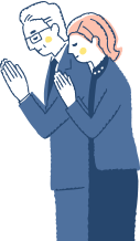 合掌する老夫婦
